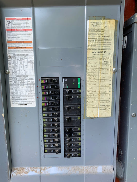 Whole-home surge protector installed in an older Square D electrical panel in Dickinson TX by ProLectric LLC.